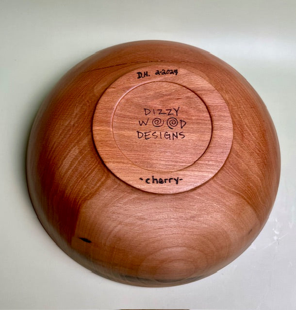 Cherry bowl with 100% food safe oil-based finish and buffed to a matte sheen.