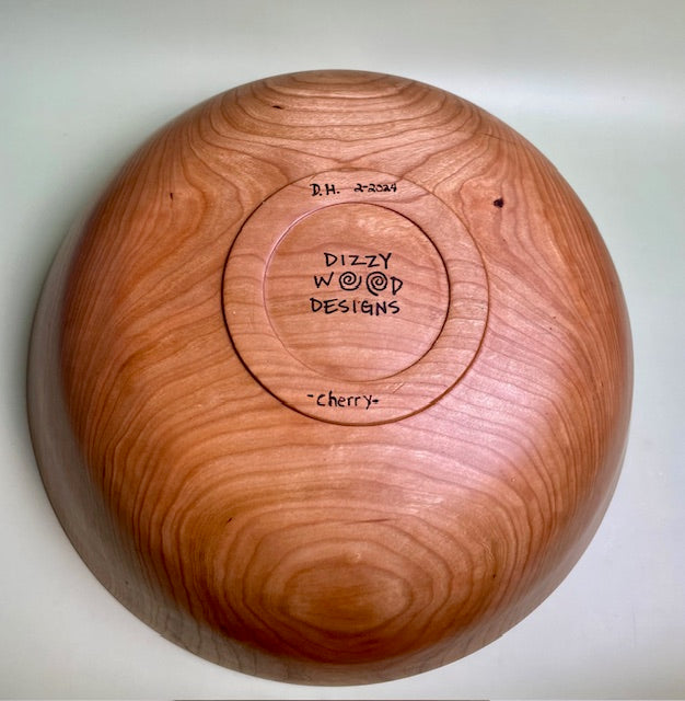 Cherry bowl with 100% food safe oil-based finish and buffed to a matte sheen.