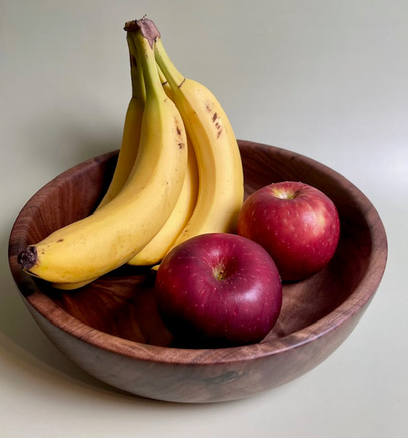 Immerse yourself in the beauty of our hand-crafted Texas black walnut bowl.