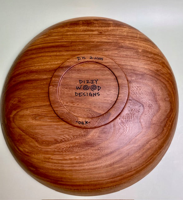 Oak bowl with 100% food safe oil-based finish and buffed to a matte sheen.