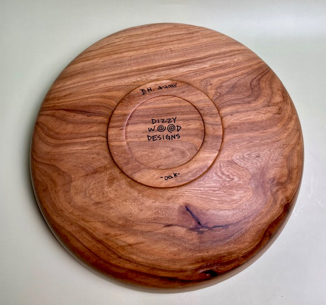 Oak bowl with 100% food safe oil-based finish and buffed to a matte sheen.