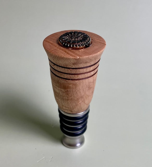 Experience the art of preserving your wine with our elegant wine bottle stopper.