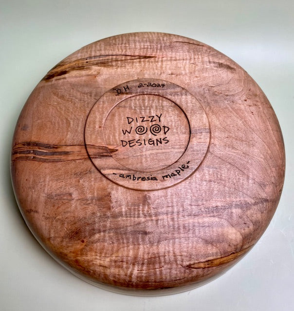 Ambrosia maple bowl with 100% food safe oil-based finish and buffed to a matte sheen.