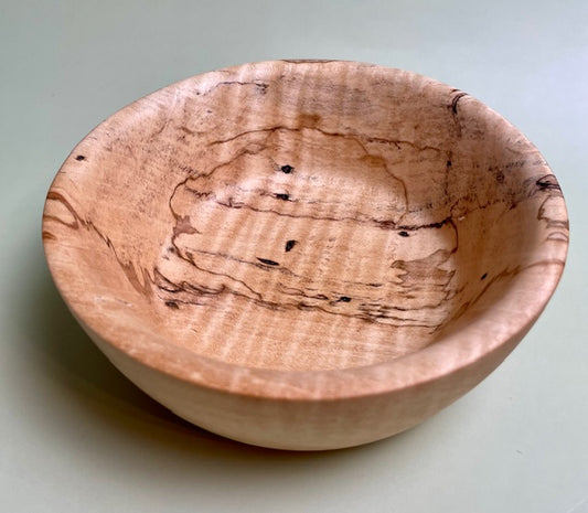 Maple bowl with 100% food safe oil-based finish and buffed to a matte sheen.