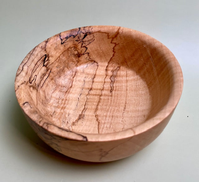 Maple bowl with 100% food safe oil-based finish and buffed to a matte sheen.