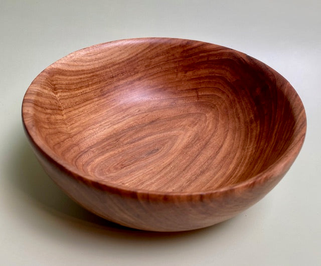 Oak bowl with 100% food safe oil-based finish and buffed to a matte sheen.