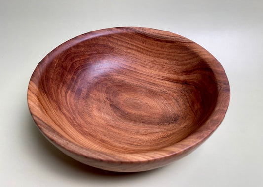 Oak bowl with 100% food safe oil-based finish and buffed to a matte sheen.