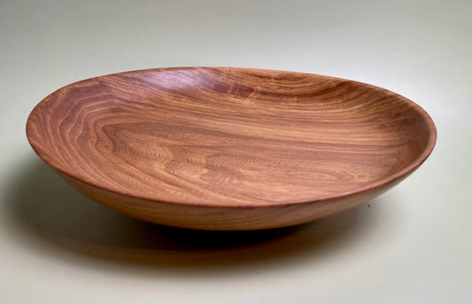 Oak bowl with 100% food safe oil-based finish and buffed to a matte sheen.