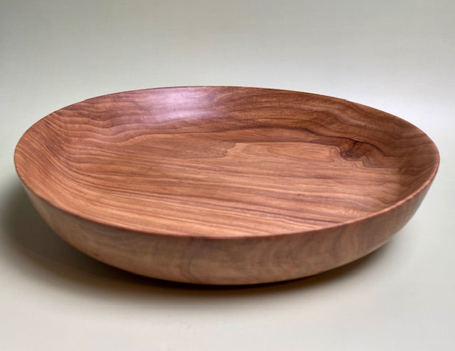 Oak bowl with 100% food safe oil-based finish and buffed to a matte sheen.