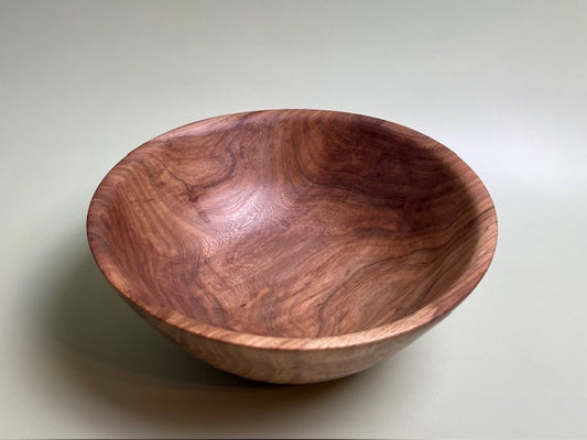 Oak bowl with 100% food safe oil-based finish and buffed to a matte sheen.