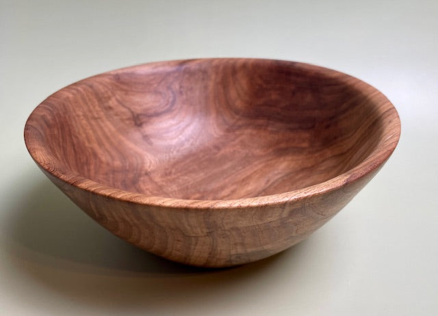 Oak bowl with 100% food safe oil-based finish and buffed to a matte sheen.