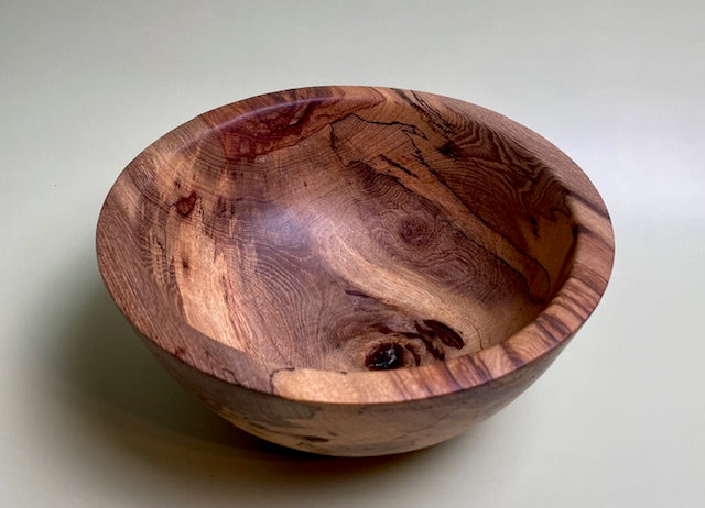 Native Texas pecan bowl with 100% food safe oil-based finish and buffed to a matte sheen.