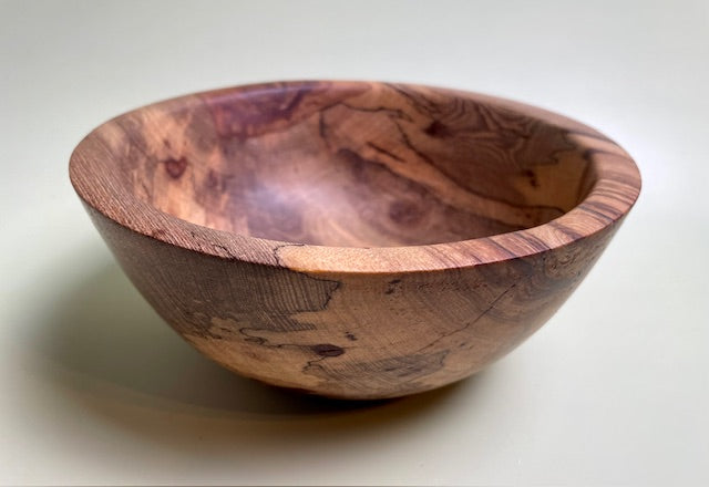 Native Texas pecan bowl with 100% food safe oil-based finish and buffed to a matte sheen.