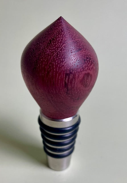 Experience the art of preserving your wine with our elegant wine bottle stopper.