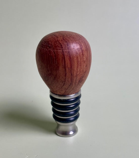 Experience the art of preserving your wine with our elegant wine bottle stopper.