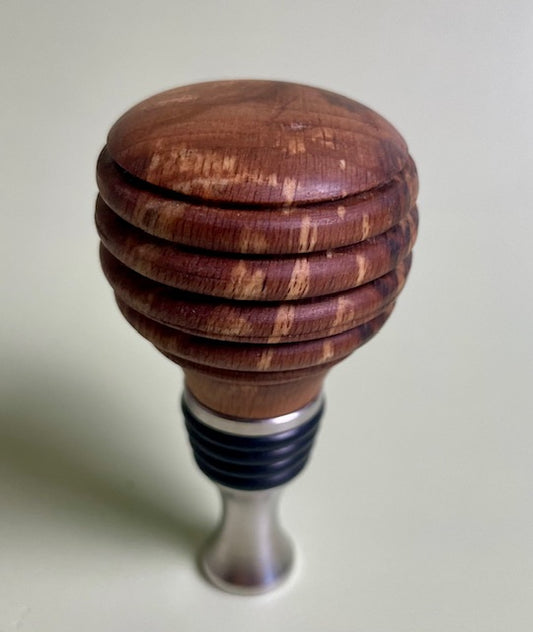 Experience the art of preserving your wine with our elegant wine bottle stopper.