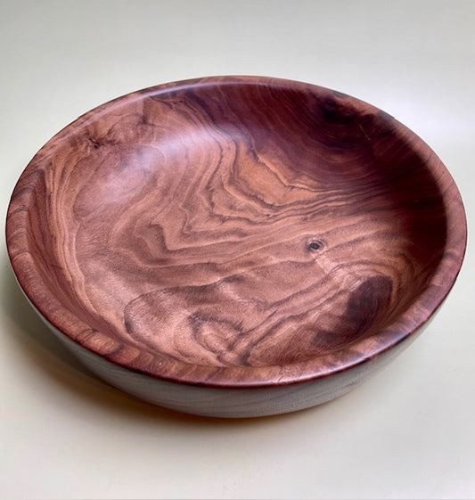 Immerse yourself in the beauty of our hand-crafted Texas black walnut bowl.