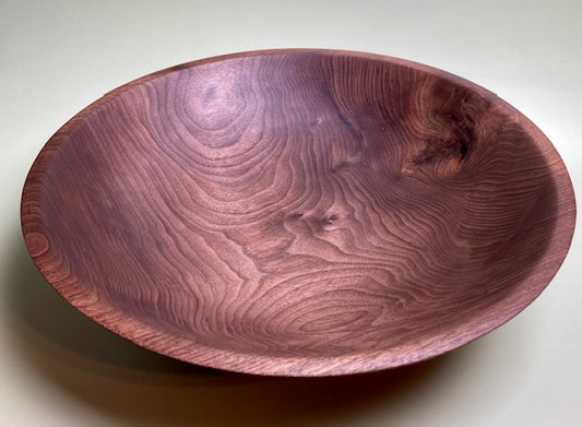 Black walnut bowl with 100% food safe oil-based finish and buffed to a matte sheen.