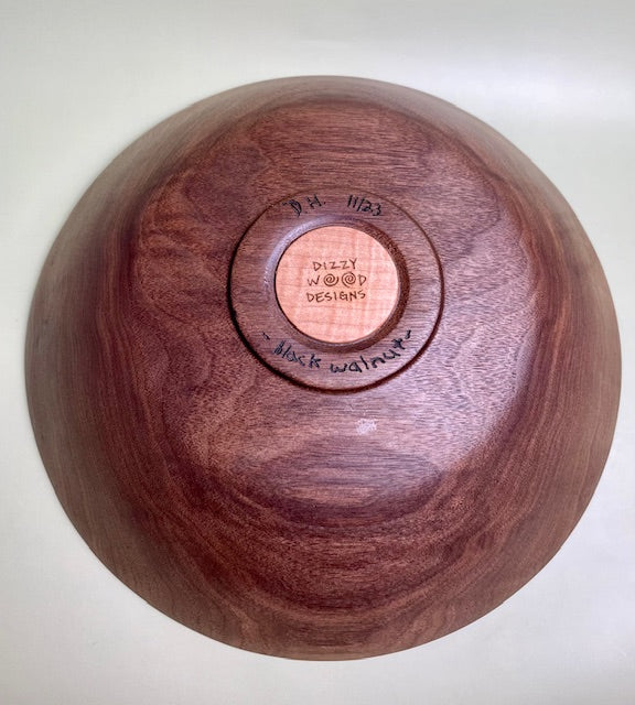 Black walnut bowl with 100% food safe oil-based finish and buffed to a matte sheen.